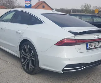 Wnętrze Audi A7 do wynajęcia w Czarnogórze. Doskonały samochód 5-osobowy. ✓ Skrzynia Automatyczna.