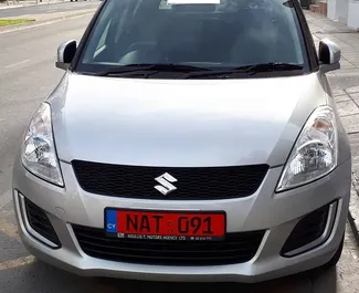 Wynajmij Suzuki Swift 2016 na Cyprze. Paliwo: Benzyna. Moc: 82 KM ➤ Koszt od 19 EUR za dobę.