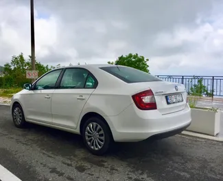 Wynajmij Skoda Rapid 2018 w Czarnogórze. Paliwo: Benzyna. Moc: 109 KM ➤ Koszt od 27 EUR za dobę.