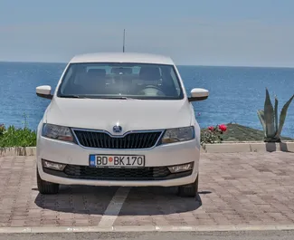 Wynajem samochodu Skoda Rapid nr 2043 (Automatyczna) w Budvie, z silnikiem 1,0l. Benzyna ➤ Bezpośrednio od Mediolan w Czarnogórze.