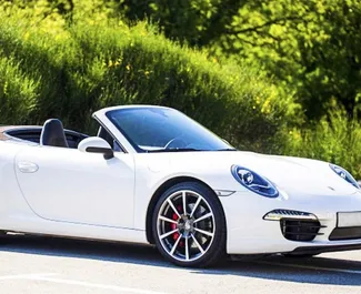 Wynajmij Porsche 911 Carrera S Cabrio 2014 w Czarnogórze. Paliwo: Benzyna. Moc: 390 KM ➤ Koszt od 400 EUR za dobę.