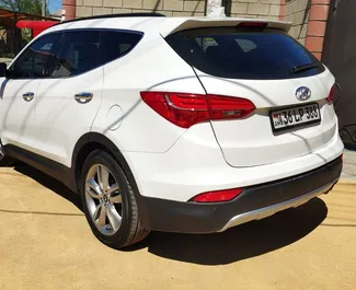 Wynajmij Hyundai Santa Fe 2015 na Krymie. Paliwo: Benzyna. Moc: 264 KM ➤ Koszt od 4248 RUB za dobę.