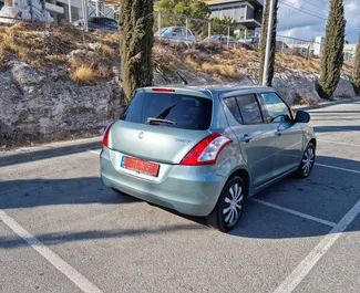 Wynajmij Suzuki Swift 2014 na Cyprze. Paliwo: Benzyna. Moc:  KM ➤ Koszt od 22 EUR za dobę.