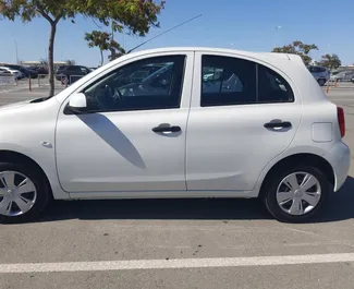 Wynajem samochodu Nissan March nr 4062 (Automatyczna) w Larnace, z silnikiem 1,2l. Benzyna ➤ Bezpośrednio od Panika na Cyprze.