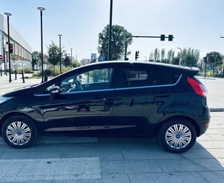 Wynajmij Ford Fiesta Ecoboost 2013 w Albanii. Paliwo: Benzyna. Moc: 125 KM ➤ Koszt od 22 EUR za dobę.