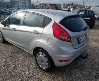 Wynajem samochodu Ford Fiesta nr 4510 (Manualna) w Tiranie, z silnikiem 1,4l. Diesel ➤ Bezpośrednio od Ilir w Albanii.