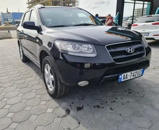 Wynajmij Hyundai Santa Fe 2009 w Albanii. Paliwo: Diesel. Moc: 150 KM ➤ Koszt od 40 EUR za dobę.