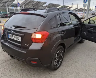 Subaru Crosstrek 2014 do wynajęcia w Tbilisi. Limit przebiegu nieograniczony.