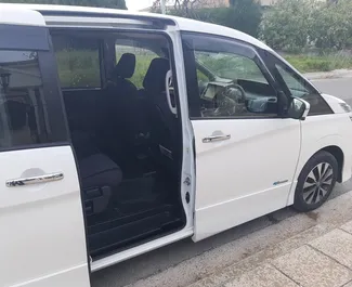 Wynajem samochodu Nissan Serena nr 6506 (Automatyczna) w Larnace, z silnikiem 2,0l. Hybryda ➤ Bezpośrednio od Panika na Cyprze.