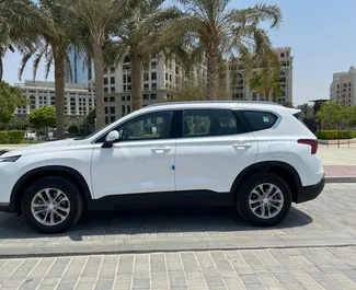 Wynajmij Hyundai Santa Fe 2023 w ZEA. Paliwo: Benzyna. Moc: 160 KM ➤ Koszt od 180 AED za dobę.