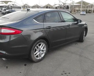 Wynajmij Ford Fusion Sedan 2014 w Gruzji. Paliwo: Benzyna. Moc: 175 KM ➤ Koszt od 65 GEL za dobę.