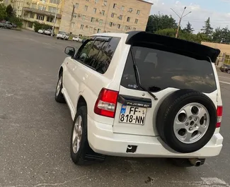 Silnik Benzyna 2,0 l – Wynajmij Mitsubishi Pajero Io w Kutaisi.