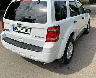 Wynajmij Ford Escape 2010 w Gruzji. Paliwo: Hybryda. Moc: 180 KM ➤ Koszt od 85 GEL za dobę.