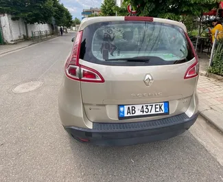 Wynajmij Renault Scenic 2011 w Albanii. Paliwo: Diesel. Moc: 110 KM ➤ Koszt od 16 EUR za dobę.