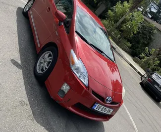 Wynajmij Toyota Prius 2011 w Gruzji. Paliwo: Hybryda. Moc: 170 KM ➤ Koszt od 80 GEL za dobę.