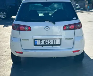 Mazda Demio – samochód kategorii Ekonomiczny na wynajem w Gruzji ✓ Bez Depozytu ✓ Ubezpieczenie: OC, FDW, Pasażerowie, Od Kradzieży.