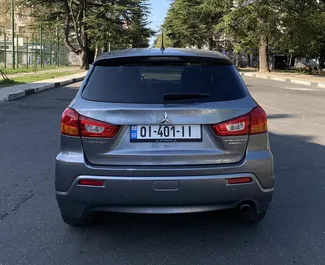 Wnętrze Mitsubishi Outlander Sport do wynajęcia w Gruzji. Doskonały samochód 5-osobowy. ✓ Skrzynia Automatyczna.