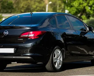 Wynajmij Opel Astra Sedan 2014 w Armenii. Paliwo: Benzyna. Moc: 140 KM ➤ Koszt od 30 USD za dobę.