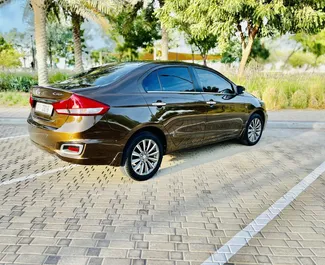 Wynajem samochodu Suzuki Ciaz nr 9130 (Automatyczna) na lotnisku Al Maktoum, z silnikiem 1,5l. Benzyna ➤ Bezpośrednio od Mikael w ZEA.