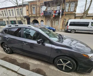 Subaru Impreza – samochód kategorii Komfort na wynajem w Gruzji ✓ Bez Depozytu ✓ Ubezpieczenie: OC, FDW, Pasażerowie, Od Kradzieży, Bez Depozytu.