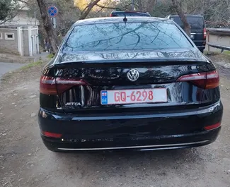 Wnętrze Volkswagen Jetta do wynajęcia w Gruzji. Doskonały samochód 5-osobowy. ✓ Skrzynia Automatyczna.