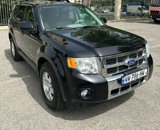 Wynajmij Ford Escape 2010 w Gruzji. Paliwo: Hybryda. Moc: 180 KM ➤ Koszt od 100 GEL za dobę.