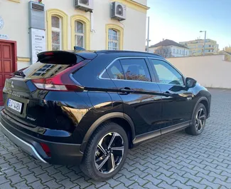 Wynajmij Mitsubishi Eclipse Cross 2022 in Czechia. Paliwo: Hybryda. Moc: 190 KM ➤ Koszt od 64 EUR za dobę.