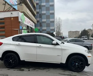 Wynajmij BMW X6 2011 w Gruzji. Paliwo: Benzyna. Moc: 360 KM ➤ Koszt od 400 GEL za dobę.