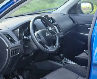 Wnętrze Mitsubishi Outlander Sport do wynajęcia w Gruzji. Doskonały samochód 5-osobowy. ✓ Skrzynia Automatyczna.