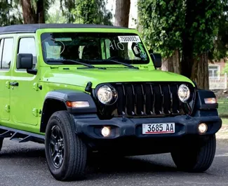 Wypożyczalnia Jeep Wrangler Sahara w Tbilisi, Gruzja ✓ Nr 10144. ✓ Skrzynia Automatyczna ✓ Opinii: 0.