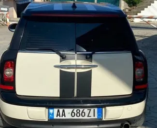 Wynajem samochodu Mini Clubman nr 9998 (Automatyczna) na lotnisku w Tiranie, z silnikiem 1,6l. Diesel ➤ Bezpośrednio od Begi w Albanii.