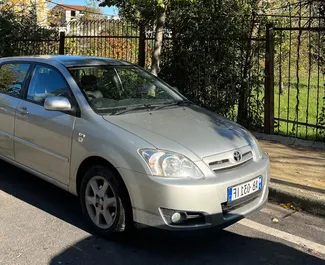 Wynajmij Toyota Corolla 2006 w Albanii. Paliwo: Diesel. Moc: 88 KM ➤ Koszt od 25 EUR za dobę.