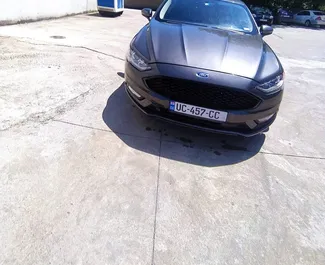 Wynajem samochodu Ford Fusion Sedan nr 10702 (Automatyczna) na lotnisku w Kutaisi, z silnikiem 2,5l. Benzyna ➤ Bezpośrednio od Nika w Gruzji.