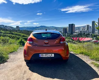 Wynajmij Hyundai Veloster 2014 w Gruzji. Paliwo: Benzyna. Moc: 136 KM ➤ Koszt od 116 GEL za dobę.