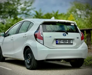 Wynajem samochodu Toyota Prius C nr 8654 (Automatyczna) w Kutaisi, z silnikiem 1,5l. Hybryda ➤ Bezpośrednio od Bakuri w Gruzji.