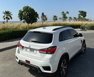 Wynajmij Mitsubishi ASX 2024 w ZEA. Paliwo: Benzyna. Moc: 171 KM ➤ Koszt od 160 AED za dobę.