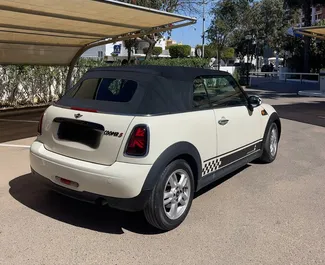 Wynajmij Mini Cooper Cabrio 2013 w Hiszpanii. Paliwo: Benzyna. Moc: 98 KM ➤ Koszt od 45 EUR za dobę.