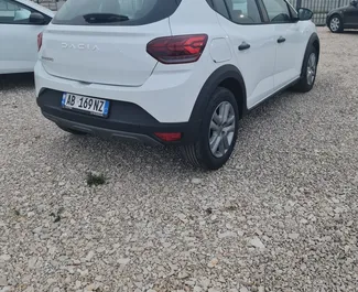 Wynajem samochodu Dacia Sandero Stepway nr 10103 (Manualna) na lotnisku w Tiranie, z silnikiem 1,0l. Benzyna ➤ Bezpośrednio od Marenglen w Albanii.