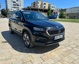 Wynajem samochodu Skoda Karoq nr 11526 (Automatyczna) na lotnisku w Tiranie, z silnikiem 2,0l. Benzyna ➤ Bezpośrednio od Leonard w Albanii.