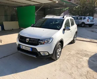 Wynajmij Dacia Sandero Stepway 2017 w Albanii. Paliwo: Diesel. Moc:  KM ➤ Koszt od 17 EUR za dobę.