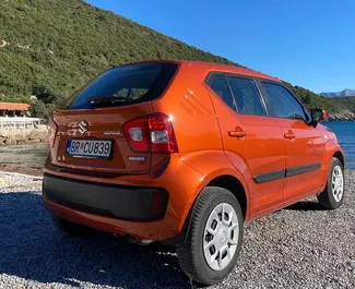 Wynajmij Suzuki Ignis 2020 w Czarnogórze. Paliwo: Hybryda. Moc: 91 KM ➤ Koszt od 15 EUR za dobę.