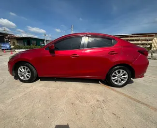 Mazda 2 – samochód kategorii Ekonomiczny na wynajem w Tajlandii ✓ Depozyt 5000 THB ✓ Ubezpieczenie: OC, CDW, SCDW, Młody.