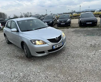 Wypożyczalnia Mazda 3 na lotnisku w Tiranie, Albania ✓ Nr 11900. ✓ Skrzynia Manualna ✓ Opinii: 0.