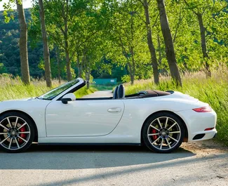 Wypożyczalnia Porsche 911 Carrera S Cabrio w Becici, Czarnogóra ✓ Nr 2480. ✓ Skrzynia Automatyczna ✓ Opinii: 0.
