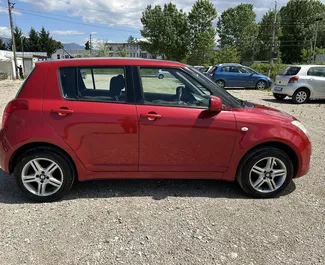 Suzuki Swift – samochód kategorii Ekonomiczny na wynajem w Albanii ✓ Depozyt 50 EUR ✓ Ubezpieczenie: OC, CDW, SCDW, FDW, Od Kradzieży, Zagranica.