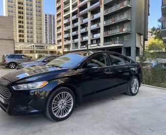 Wynajmij Ford Fusion Sedan 2014 w Gruzji. Paliwo: Benzyna. Moc: 170 KM ➤ Koszt od 100 GEL za dobę.