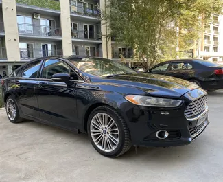 Wypożyczalnia Ford Fusion Sedan w Tbilisi, Gruzja ✓ Nr 13414. ✓ Skrzynia Automatyczna ✓ Opinii: 0.