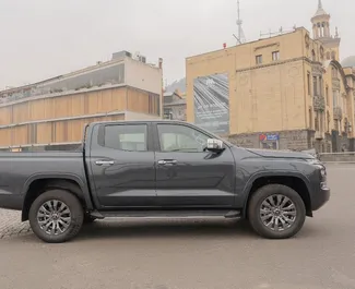 Wynajmij Mitsubishi L200 2024 w Gruzji. Paliwo: Diesel. Moc: 184 KM ➤ Koszt od 299 GEL za dobę.