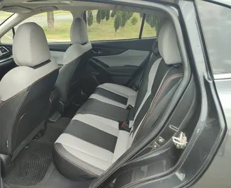 Wnętrze Subaru Crosstrek do wynajęcia w Gruzji. Doskonały samochód 5-osobowy. ✓ Skrzynia Automatyczna.