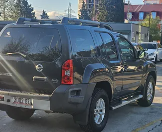 Wynajmij Nissan X-Terra 2015 w Gruzji. Paliwo: Benzyna. Moc:  KM ➤ Koszt od 200 GEL za dobę.